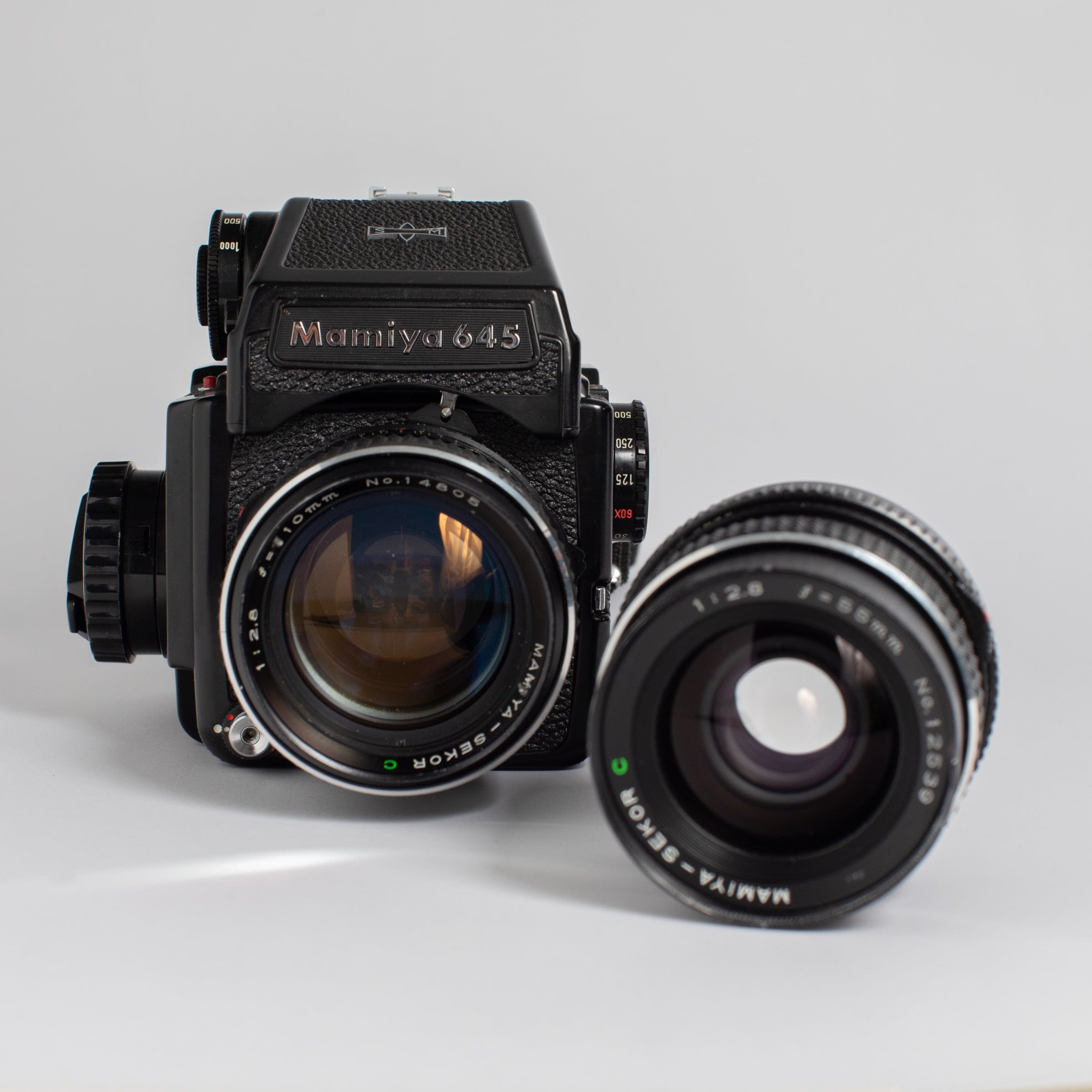 Mamiya M645 J with 55mm f/2.8 and 110mm f/2.8 – Film Supply Club