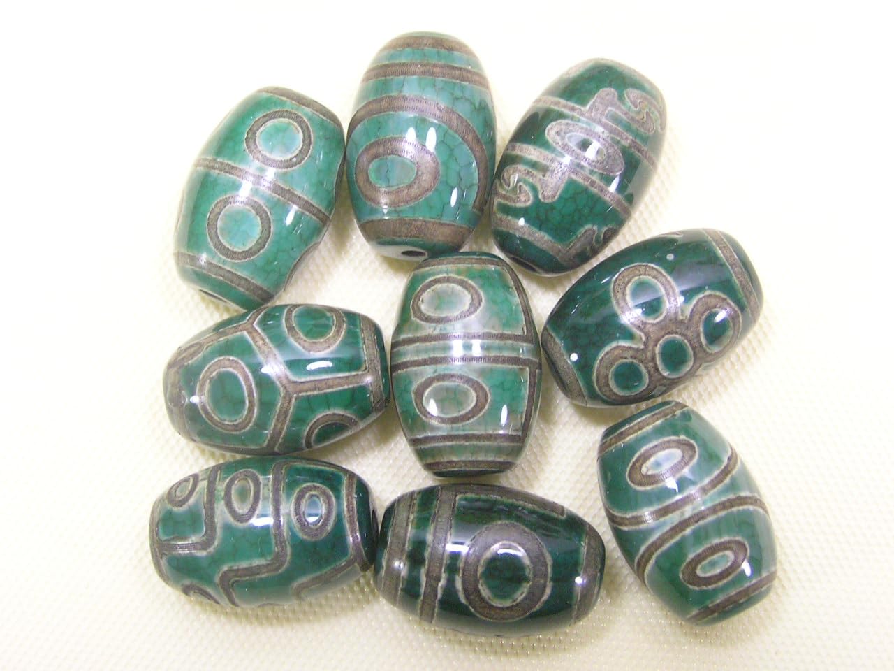 Amazon.co.jp: チベット天珠 緑色の龍紋 七眼天珠(なながんてんじゅ