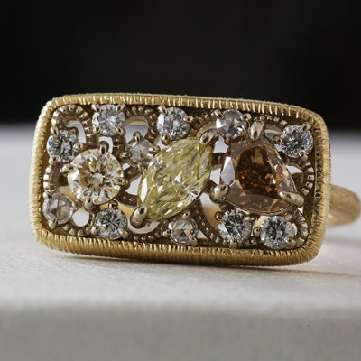 限定1本 K18YG/K18CGコンビ 0.93ct 蛍光 マルチカラーダイヤモンド