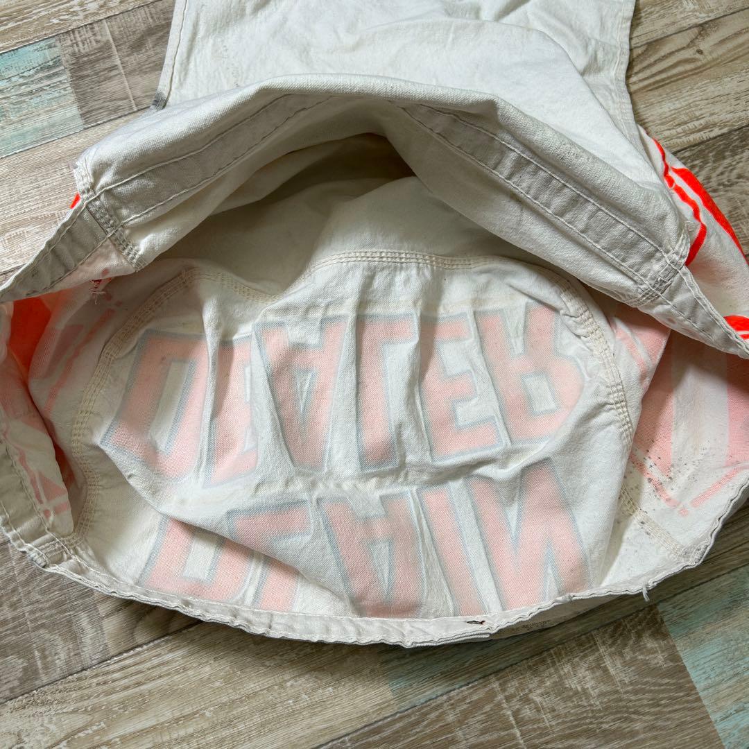 レア PLAIN DEALER ニュースペーパーバッグ オレンジ - メルカリ